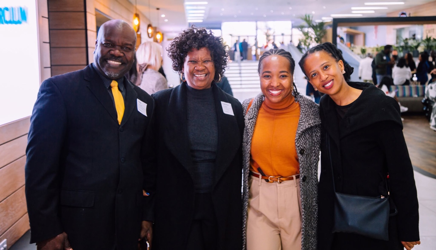 Four generations of church family smiling together